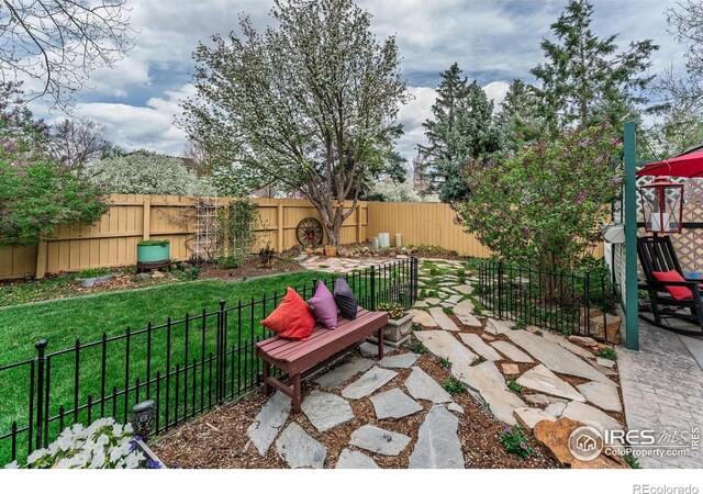 2225 Clayton Cir, Superior, CO 80027 - view of patio with a fenced backyard
