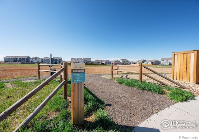 view of yard featuring a residential view