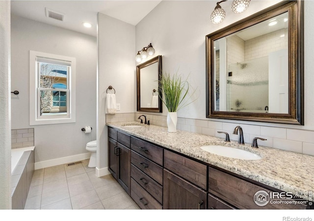 full bathroom featuring walk in shower, visible vents, a sink, and toilet