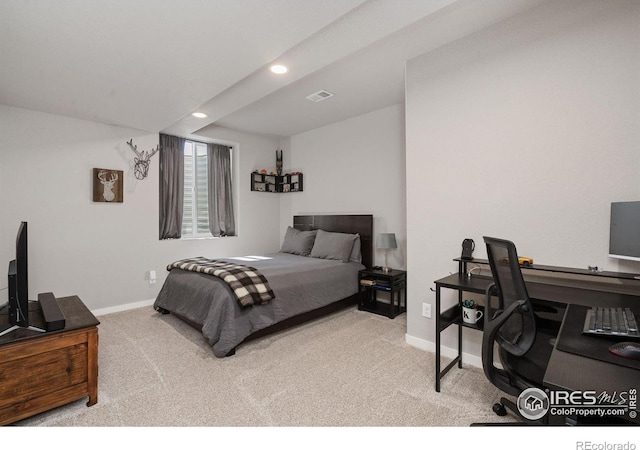 bedroom featuring visible vents, baseboards, recessed lighting, and light colored carpet