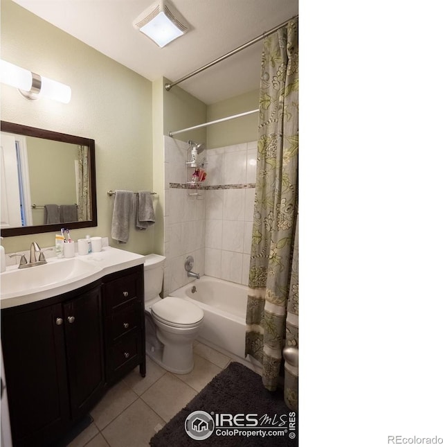 1504 Washington Ave, Louisville, CO 80027 - bathroom with tile patterned flooring, visible vents, toilet, vanity, and shower / bath combo