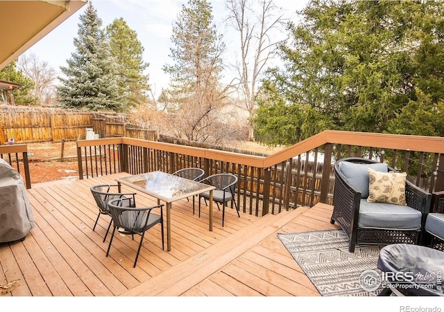 1504 Washington Ave, Louisville, CO 80027 - deck featuring outdoor dining space and fence