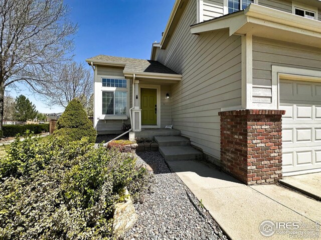 6502 Carmichael St, Fort Collins, CO 80528 - entrance to property with a shingled roof