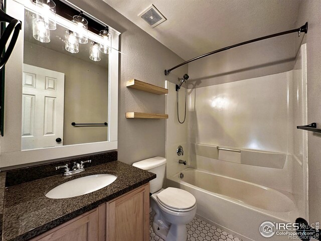 6502 Carmichael St, Fort Collins, CO 80528 - full bathroom featuring tile patterned floors, vanity, shower / bath combination, toilet, and visible vents