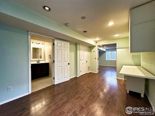 6502 Carmichael St, Fort Collins, CO 80528 - interior space with baseboards, a sink, dark wood-style floors, and recessed lighting