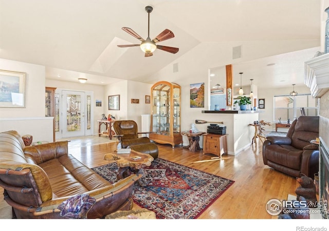 7421 18th St, Greeley, CO 80634 - living area featuring a ceiling fan, visible vents, high vaulted ceiling, and light wood-style flooring