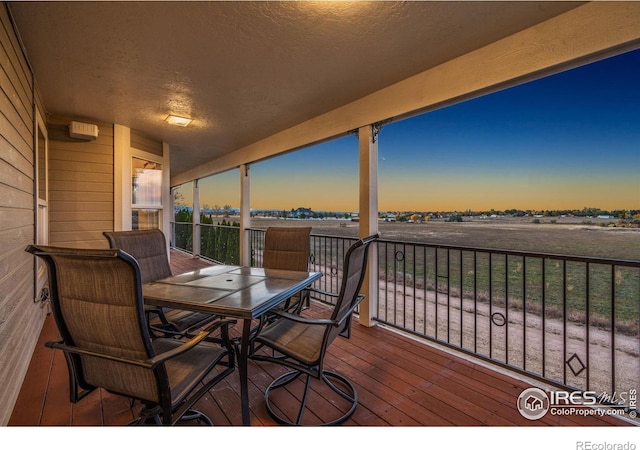 7421 18th St, Greeley, CO 80634 - wooden terrace with outdoor dining area