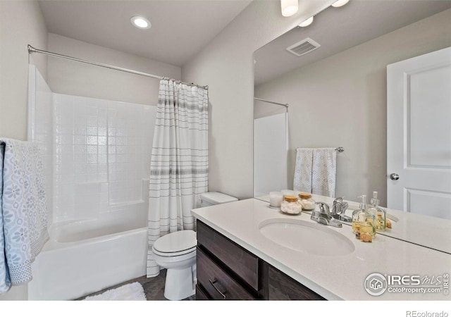 2838 Sykes Dr, Fort Collins, CO 80524 - full bath with shower / bath combo, vanity, toilet, visible vents, and recessed lighting
