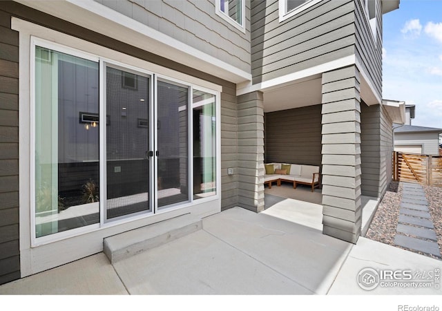 2838 Sykes Dr, Fort Collins, CO 80524 - view of patio / terrace featuring an outdoor hangout area and fence