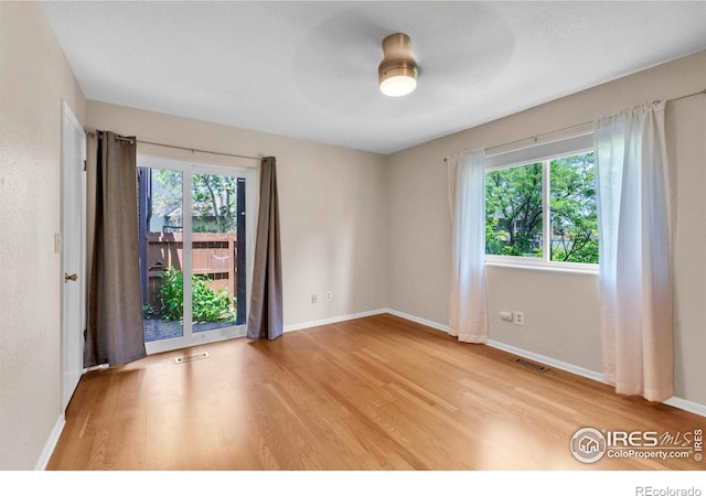 6221 Willow Ln, Boulder, CO 80301 - unfurnished room with light wood-type flooring, baseboards, and a ceiling fan