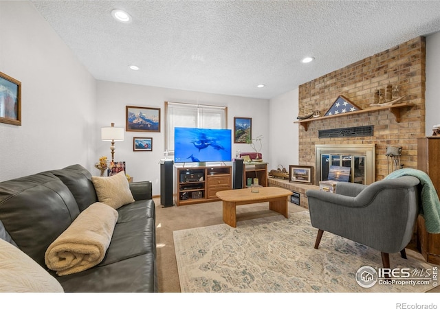 2417 15th Ave, Longmont, CO 80503 - living area featuring recessed lighting, a brick fireplace, carpet floors, and a textured ceiling