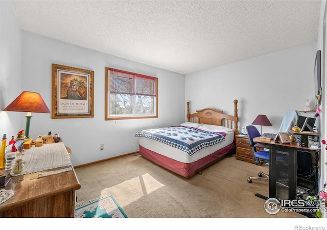 2417 15th Ave, Longmont, CO 80503 - carpeted bedroom featuring baseboards and a textured ceiling