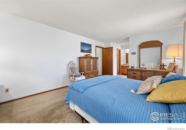 2417 15th Ave, Longmont, CO 80503 - carpeted bedroom featuring baseboards and a textured ceiling