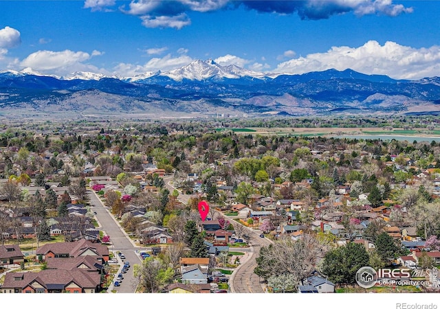 2417 15th Ave, Longmont, CO 80503 - drone / aerial view with a residential view and a mountain view