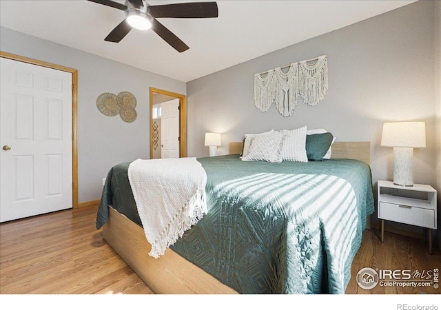 1114 Berwick Ct, Fort Collins, CO 80524 - bedroom featuring wood finished floors and a ceiling fan