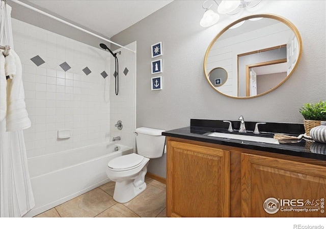 1114 Berwick Ct, Fort Collins, CO 80524 - full bath featuring shower / bath combo, toilet, vanity, and tile patterned floors