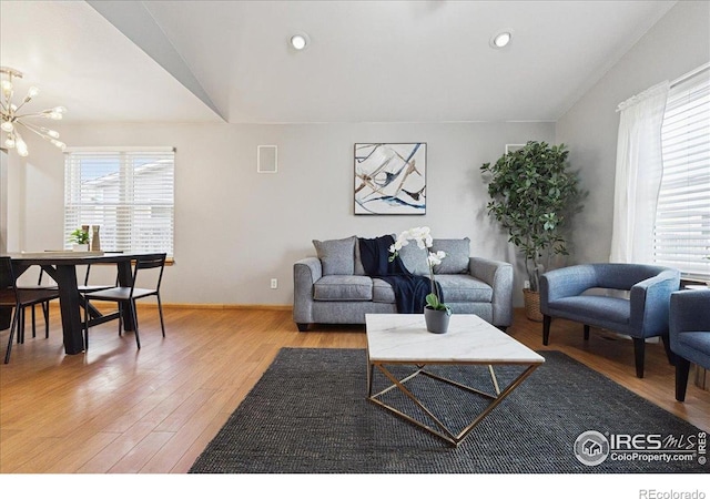 1114 Berwick Ct, Fort Collins, CO 80524 - living area featuring light wood-style floors and baseboards