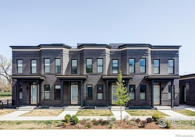 859 30th St, Denver, CO 80205 - townhome / multi-family property with brick siding