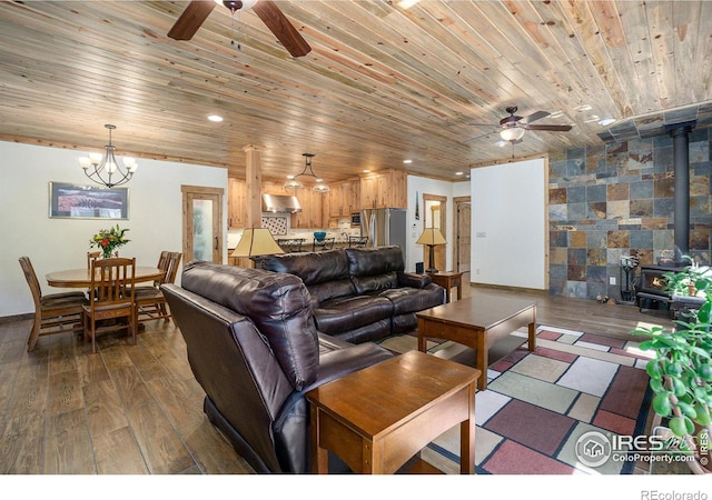 223 Kings Canyon Rd, Bellvue, CO 80512 - living room with a ceiling fan, a wood stove, dark wood-style floors, wooden ceiling, and recessed lighting