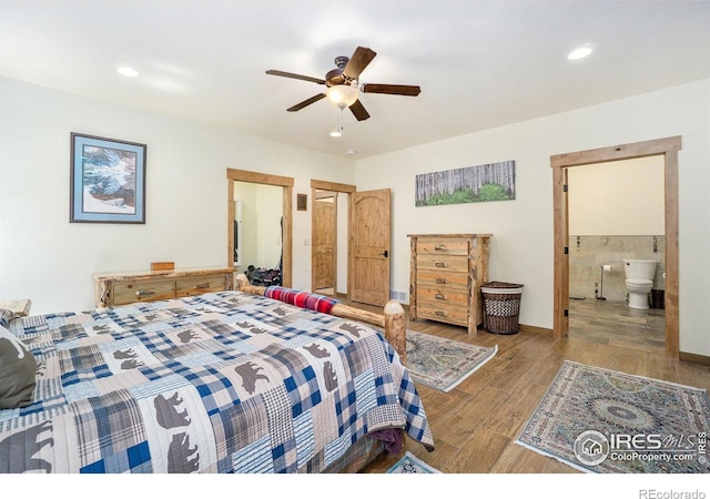 223 Kings Canyon Rd, Bellvue, CO 80512 - bedroom featuring wood finished floors, recessed lighting, ensuite bath, and ceiling fan