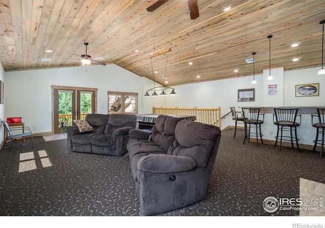 223 Kings Canyon Rd, Bellvue, CO 80512 - living area with ceiling fan, carpet flooring, wood ceiling, baseboards, and vaulted ceiling