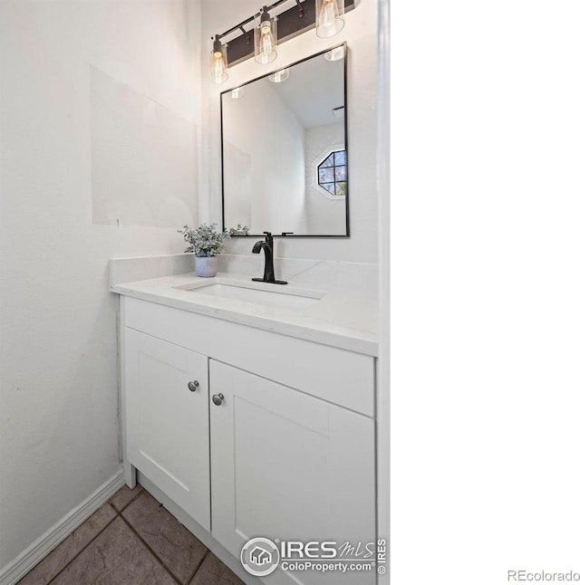 bathroom with vanity and tile patterned floors