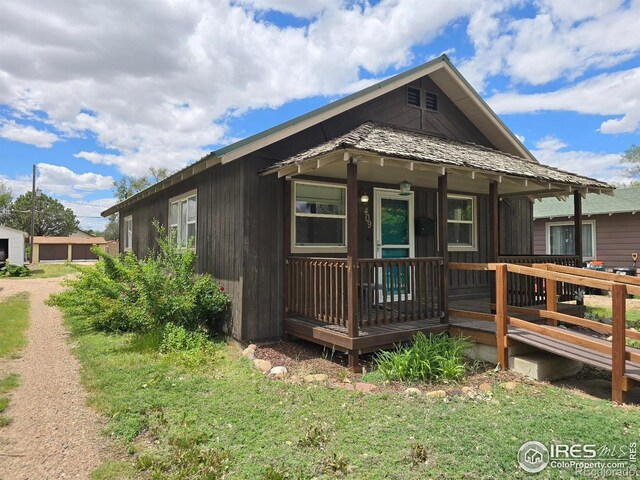 409 N 4th Ave, Sterling, CO 80751 - view of front of house with a porch