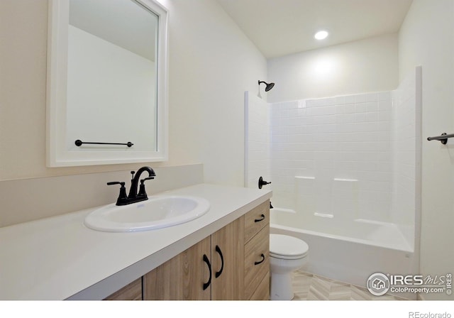 1039 Spartan Ave, Berthoud, CO 80513 - bathroom with toilet, vanity, washtub / shower combination, and recessed lighting