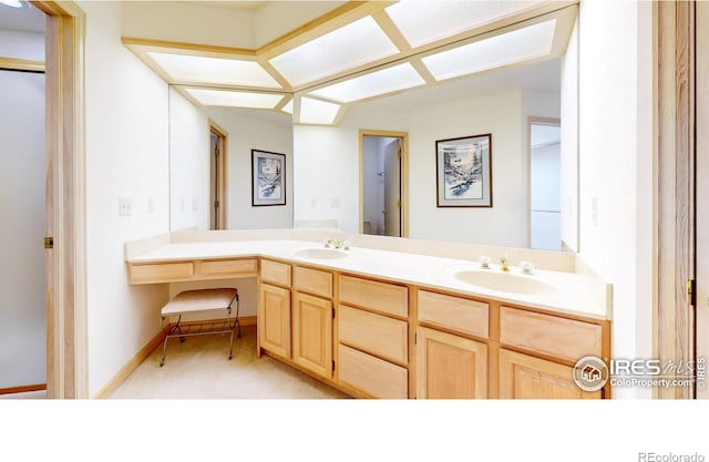 1162 Fairway Club Ln Unit 1, Estes Park, CO 80517 - full bath with baseboards, a sink, and double vanity