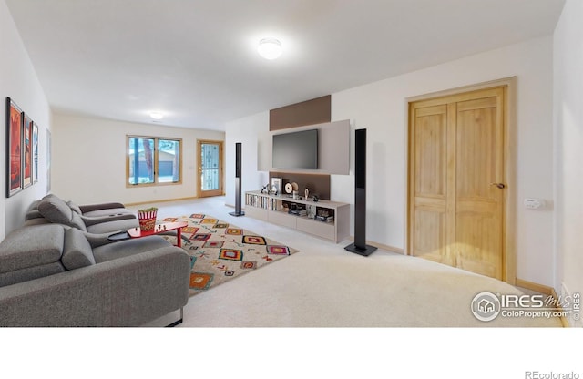 1162 Fairway Club Ln Unit 1, Estes Park, CO 80517 - living area featuring carpet flooring and baseboards