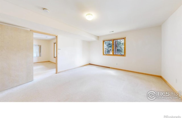 1162 Fairway Club Ln Unit 1, Estes Park, CO 80517 - spare room with carpet flooring and baseboards
