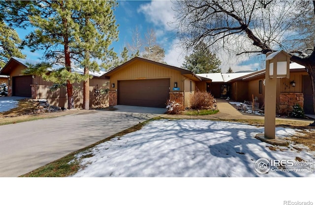 1162 Fairway Club Ln Unit 1, Estes Park, CO 80517 - single story home with an attached garage and driveway
