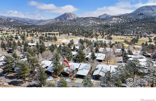 1162 Fairway Club Ln Unit 1, Estes Park, CO 80517 - drone / aerial view featuring a residential view and a mountain view