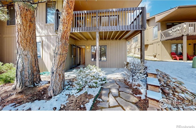 1162 Fairway Club Ln Unit 1, Estes Park, CO 80517 - snow covered patio with a balcony