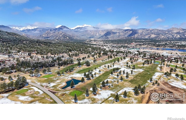1162 Fairway Club Ln Unit 1, Estes Park, CO 80517 - bird's eye view with a water and mountain view
