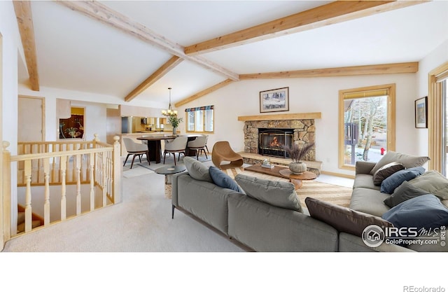 1162 Fairway Club Ln Unit 1, Estes Park, CO 80517 - carpeted living area featuring a fireplace and vaulted ceiling with beams