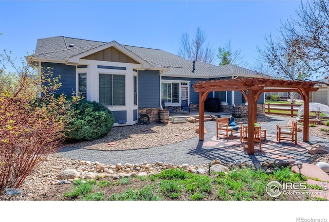 view of patio / terrace with a pergola and fence