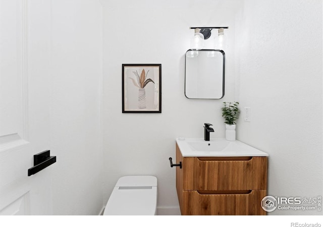 7102 S Harrison Ct, Centennial, CO 80122 - bathroom with toilet and vanity