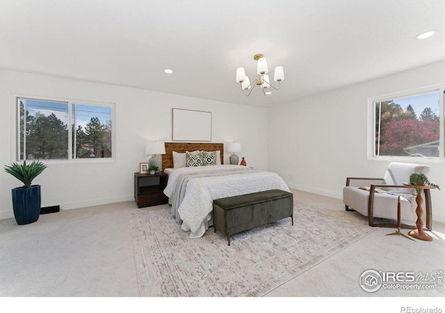 7102 S Harrison Ct, Centennial, CO 80122 - carpeted bedroom featuring a chandelier, multiple windows, recessed lighting, and baseboards