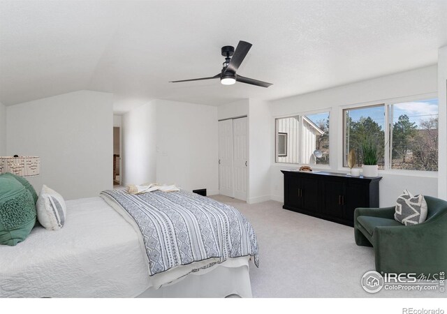 7102 S Harrison Ct, Centennial, CO 80122 - bedroom featuring carpet floors, a closet, ceiling fan, vaulted ceiling, and baseboards