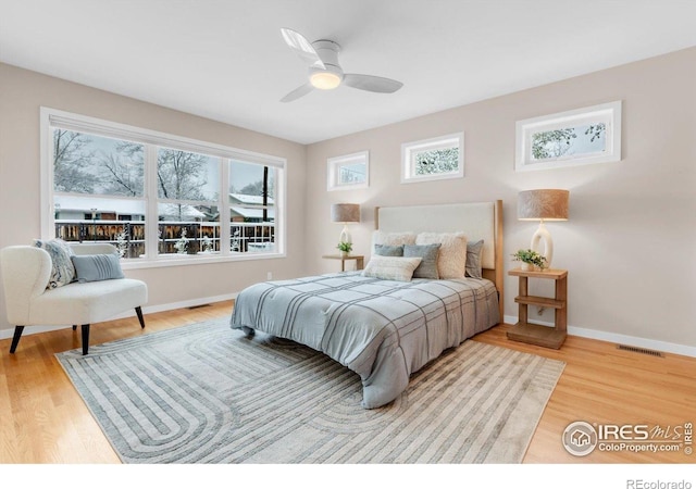 195 S 35th St, Boulder, CO 80305 - bedroom featuring light wood finished floors, baseboards, a ceiling fan, and visible vents
