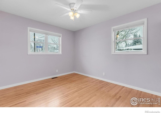 195 S 35th St, Boulder, CO 80305 - spare room with baseboards, light wood-style floors, visible vents, and a ceiling fan