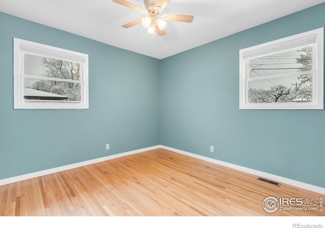 195 S 35th St, Boulder, CO 80305 - empty room featuring plenty of natural light, visible vents, and baseboards