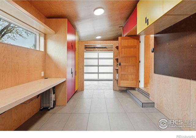 interior space with light tile patterned floors