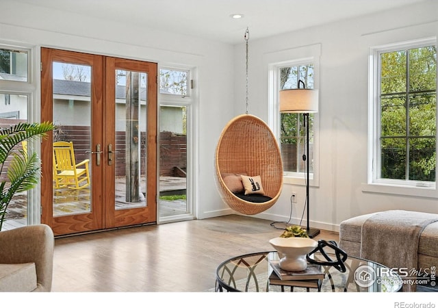 doorway featuring recessed lighting, baseboards, french doors, and wood finished floors