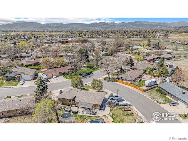 bird's eye view featuring a mountain view and a residential view