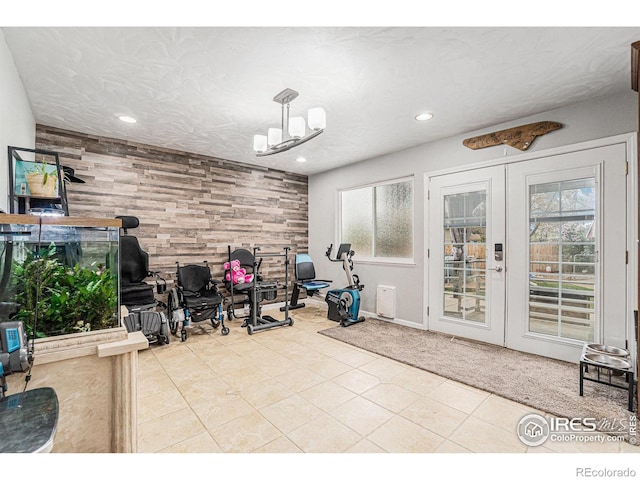 game room featuring french doors, recessed lighting, and tile patterned floors