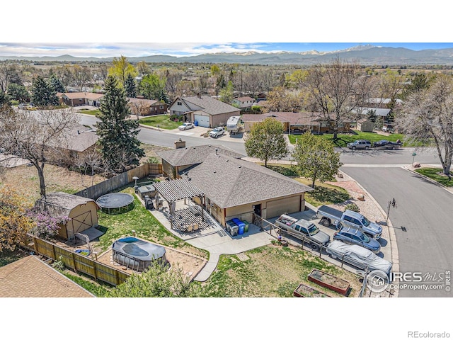 aerial view featuring a residential view and a mountain view