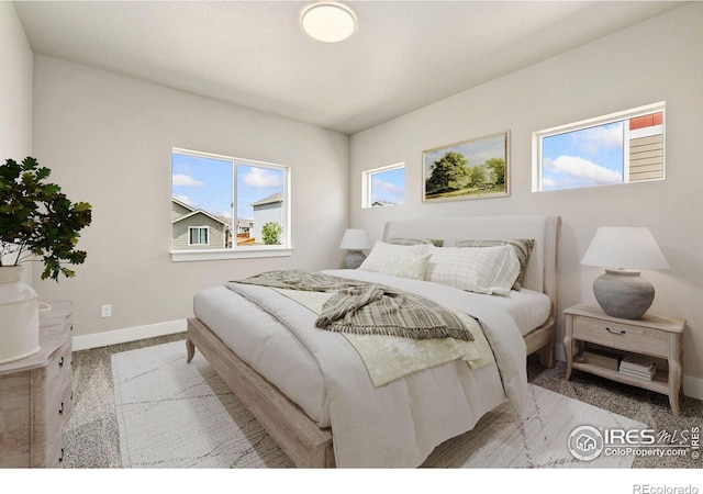 1755 Avery Plaza St, Severance, CO 80550 - bedroom featuring baseboards and carpet