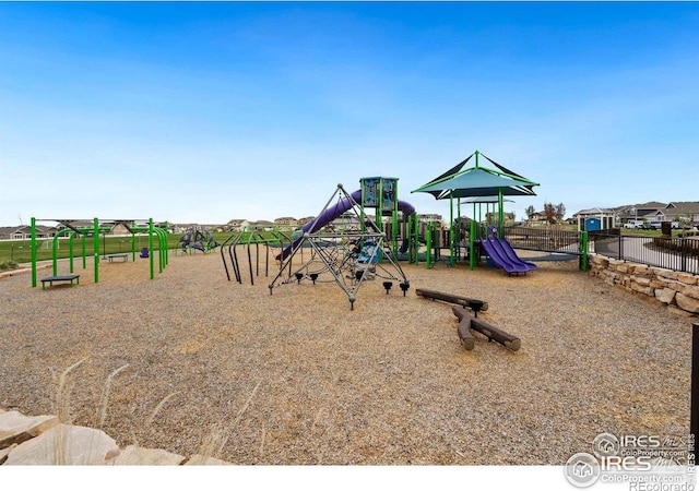 community jungle gym with fence